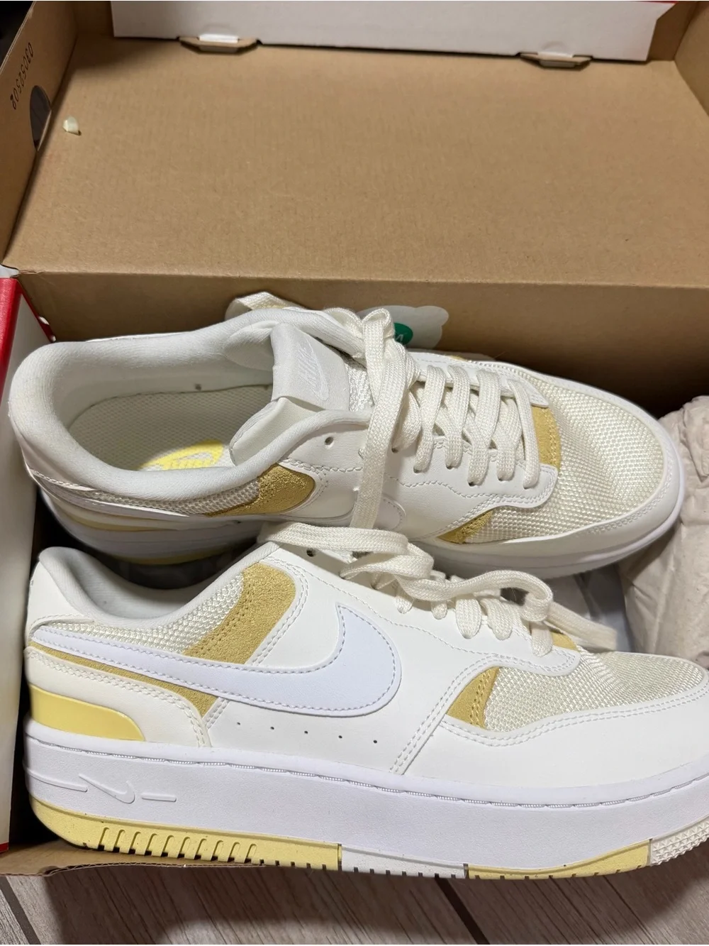 Nike Women’s White and Pale Yellow Low-Top Sneakers